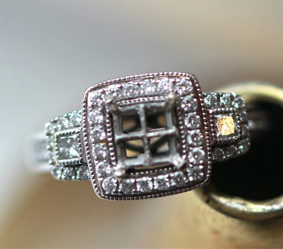 Diamond ring setting shown during the jewelry repair process
